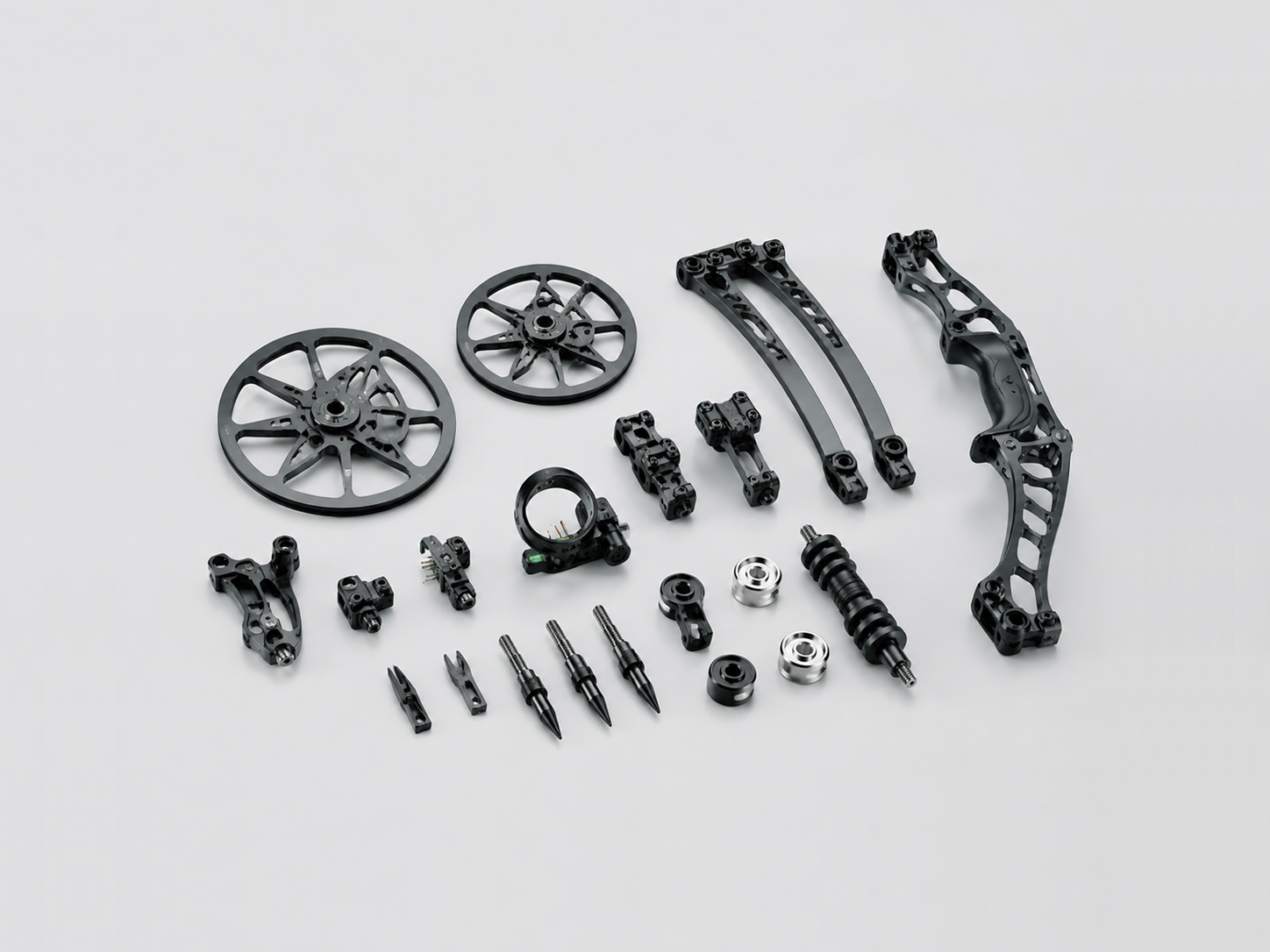 High-performance archery and bow equipment components including eccentric wheels, limb mounts, arrow rests and trigger assemblies made with amorphous alloy materials