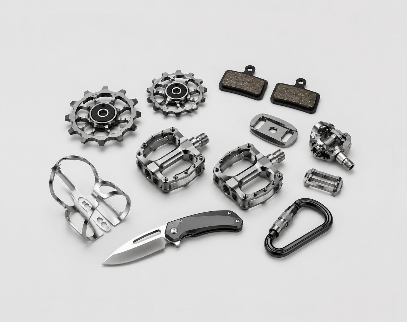 High-performance outdoor and cycling gear components including bicycle derailleur pulleys, pedal axles, outdoor knives and protective equipment parts made with amorphous alloy materials
