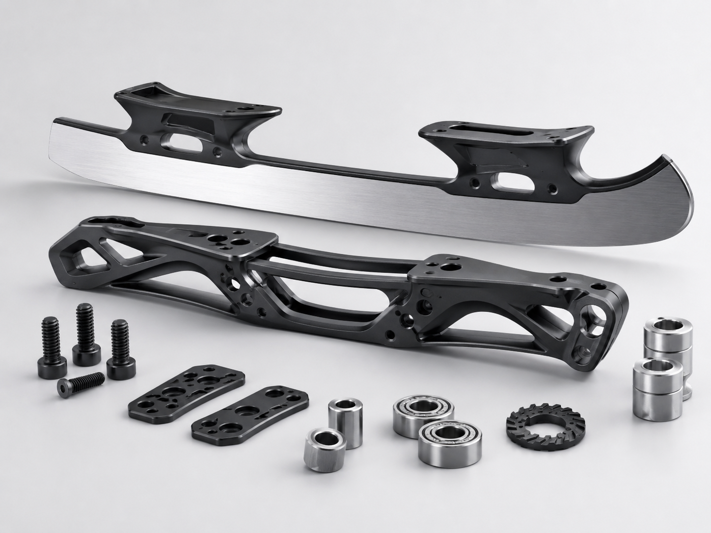 Precision ski equipment components made with amorphous alloys, providing lightweight strength, wear resistance and long service life