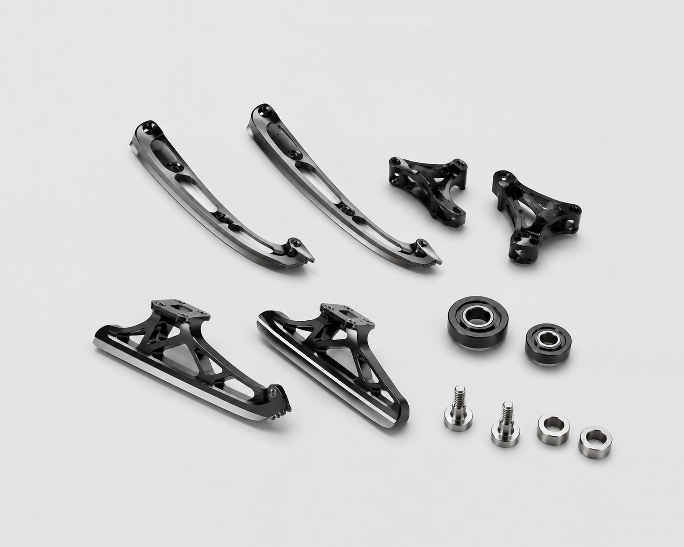 High-performance winter sports equipment components including ice skate blades, ski edges, binding parts and ski pole tips made with amorphous alloy materials